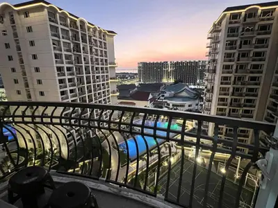 a balcony with a view of some buildings at Solemare parksuites with balcony tower C in Manila
