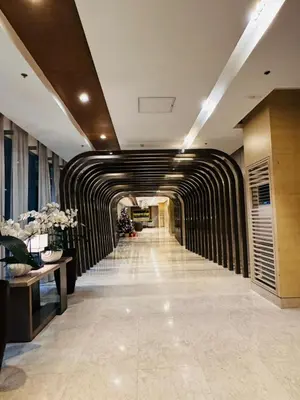 a hallway in a building with a tunnel at AR Pahinga Place - The Pause House in Manila