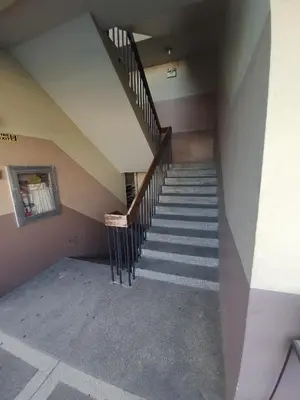 an empty staircase in a building with a stair case at Nemar Building Solo Room w AC in Manila