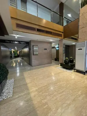 an empty lobby with a large lobby with a lobby at Antel Spa Residences 15A in Manila