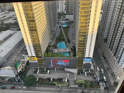 an aerial view of a city with tall buildings at PaulBert's Cabins I in Manila
