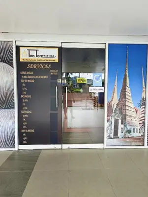 a store door with a sign in a building at Shell Residences Mall of Asia by Jhem in Manila