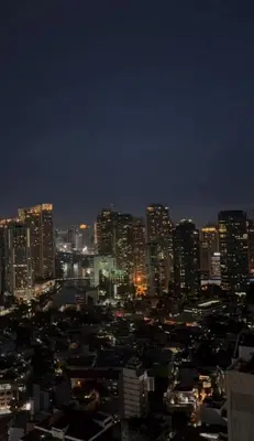 a city skyline at night with tall buildings at Cozy and Aesthetic Vibes - Makati Manila Staycation in Manila
