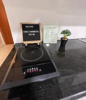 a welcome to have a wonderful singo sign on a counter at Charming condo unit Across US Embassy in Manila