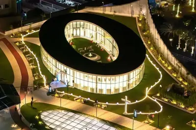a large building with lights on it at night at Shore Residences 2 Beds Forest Green RM 630 by Prime Stay in Manila