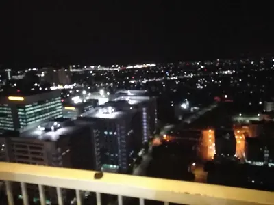 a view of a city skyline at night at Venice Mall Area Mckinley Hills Taguig in Manila