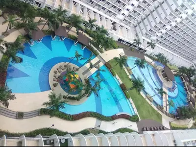 an overhead view of a pool on a cruise ship at Kempt Pasay City Apartment for Rent - Perfect for Short-Term Stay front of MOA in Manila