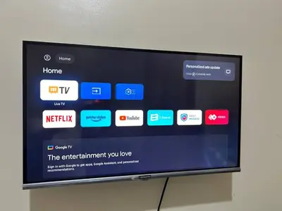 a television screen with many different apps on it at Kempt Pasay City Apartment for Rent - Perfect for Short-Term Stay front of MOA in Manila