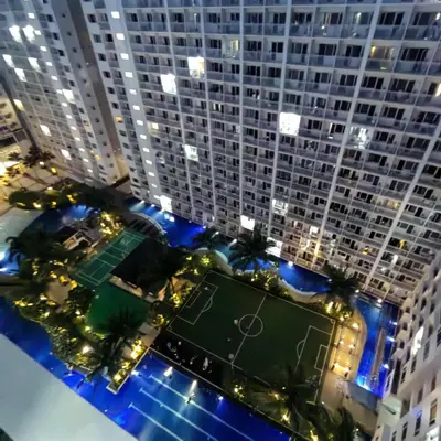 an overhead view of a large building with a tennis court at Esthetic vibes in Manila