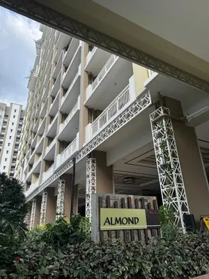 a sign in front of a building with a bunch of books at J Suite in Manila