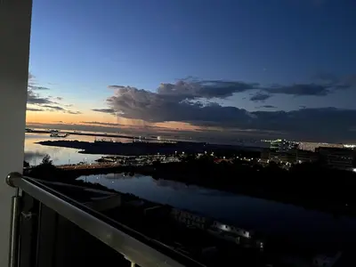 a view of a body of water at sunset at Perfect Sunset View in Pasay Near MOA & NAIA in Manila