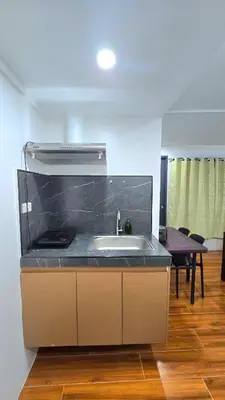 a kitchen with a sink and a counter top at Studio Units near Airport by Jade Studio Apartments in Manila