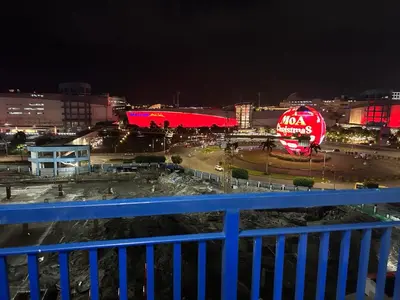 a view of a city at night at Family Condo SMB in Manila