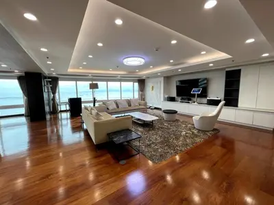 a large living room with a couch and a table at Ultra Luxury 5BR Penthouse in Manila Bay Rizal Park in Manila