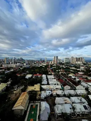 an aerial view of a city with buildings and houses at Greenhills Garden Square Residences 2BR & 2 Toilets Quezon City in Manila