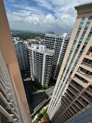 an aerial view of a city with tall buildings at Casa Venice Rustic Pet Friendly Studio Balcony in Manila