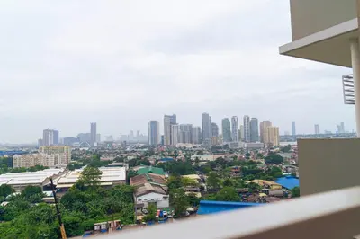 a view of a city with tall buildings at Casa Celestine Staycation in Manila