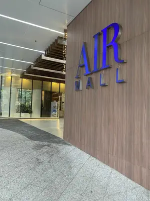 a large building with a large amazon sign on it at Air Residences 28F Balcony WiFi Netflix in Manila