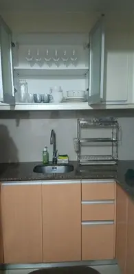 a kitchen with a sink and a counter top at Cluster 4 7G in Manila