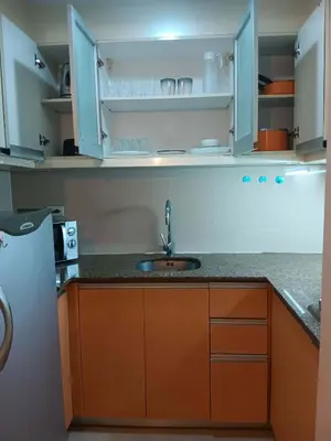 a kitchen with a sink and a counter top at Cluster 5 9H in Manila