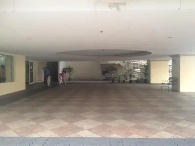 a large empty room with a large ceiling at Studio Condominium near the US Embassy in Manila in Manila