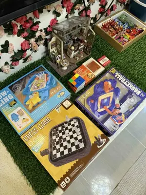 a lego table with a chessboard and toys on it at shore residences admin in Manila