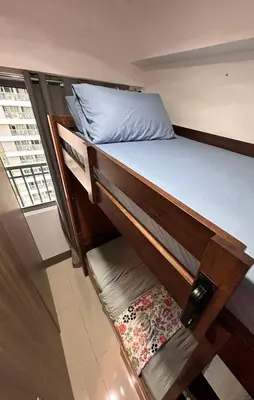 a bunk bed in a small room with at City Escape by Fame in Manila