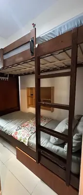 two bunk beds in a room withthritisthritisthritisthritisthritisthritisthritisthritisthritis at City Escape by Fame in Manila