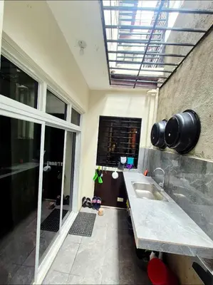 a bathroom with a sink and a large window at Casa Deña Lawa - Cozy Staycation in Calamba in Calamba