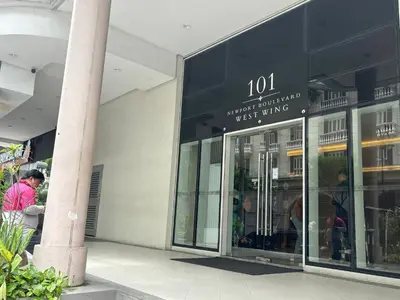a store front of a building with a sign on it at Newport Inn in Manila