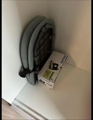 a pizza box and a box in a wall at MOA Condotel 1BR fast WiFi in Manila