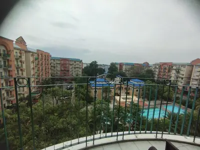 a view of a swimming pool from a balcony at Chateau Elysee Condominium in Manila