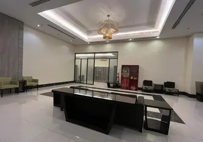 a large room with a table and chairs in it at The Nest - Woodlands in Manila