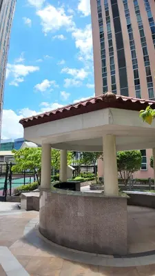 a pavilion in front of a tall building at 29H Ultimate Esports Studio Massage Chair Pro Setup in Manila