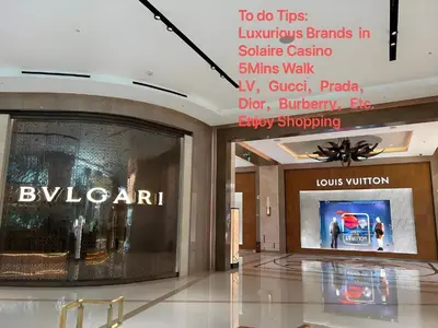 a lobby of a shopping mall with a sign for a store at 120 Sqm Modern 3Bedrooms HighRise Facing Manila Bay, Near Airports, Okada Casino, Solaire Casino, MOA with free parking in Manila
