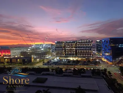 a view of a city at night with buildings at Shore ka na ba in Manila