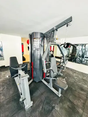 a gym with two treadmills and a treadmill at Cozy Family Suite with City View near City of Dreams Casino, Airport, Solaire, Okada, Ayala Malls and MOA in Manila