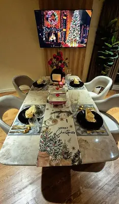 a table with plates of food on top of it at Luxe 1BR Panorama Suite at Novotel Aqua in Manila