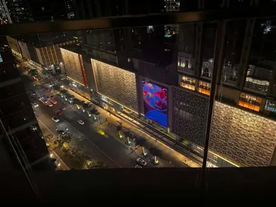 an aerial view of a busy city street at night at Luxury-Styled 2BR Uptown T2 Parksuites BGC in Manila