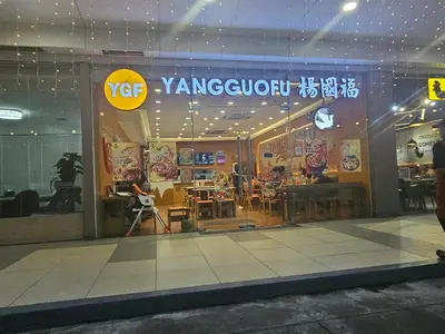 a store front of a restaurant with a sign on the window at Shore Residences Tower D Viann in Manila