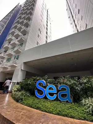 a sign in front of a seagate building at Sea Residences Elegant Place by Bella in Manila