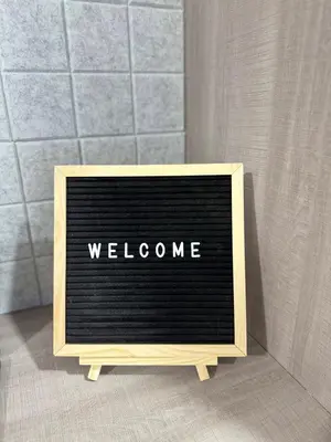 a sign with the word welcome written on it at Yakal tanza garden height with Netflix in Tanza
