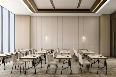 a dining room with tables and chairs and windows at AC Hotel by Marriott Manila in Manila