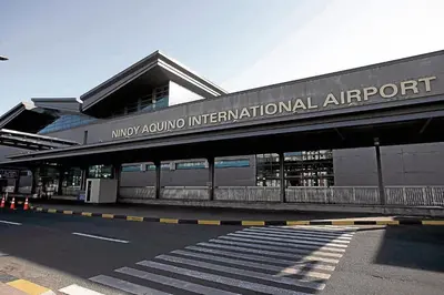 a building with a sign that reads moyundai international airport at 1 Bedroom Apartment Condo Across Manila Airport NAIA T3 in Manila