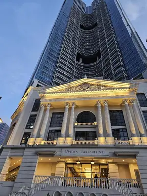 a view of a building with a large skyscraper at 35th Prime Staycation BGC in Manila
