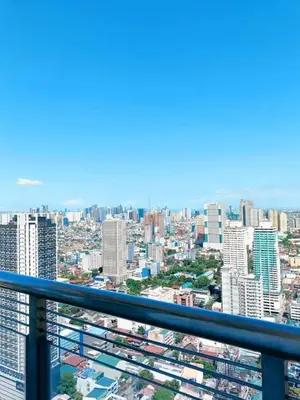 a view of a city from the top of a building at Manila bay view condo birch tower in Manila