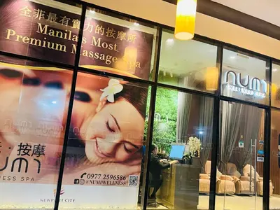 a store window with a poster of a woman at D'Gonia Space in Manila