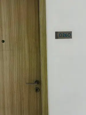 a close up of a door with a sign on it at Cozy Staycation at Shore Residences near Mall Of Asia MOA in Manila