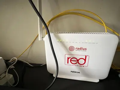 a white router with a cord hooked up to it at Mandaluyong HomeBest Place to Stay! in Manila