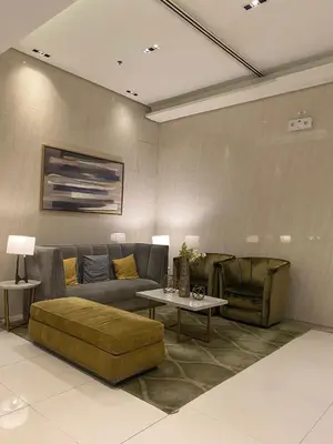 a living room with a couch and a table at Vienna Condotel at 101 Newport Blvd in Manila